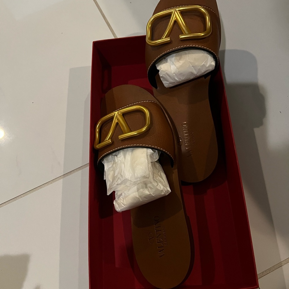 Used Valentino shoes in brown color. Staple piece to any wardrobe